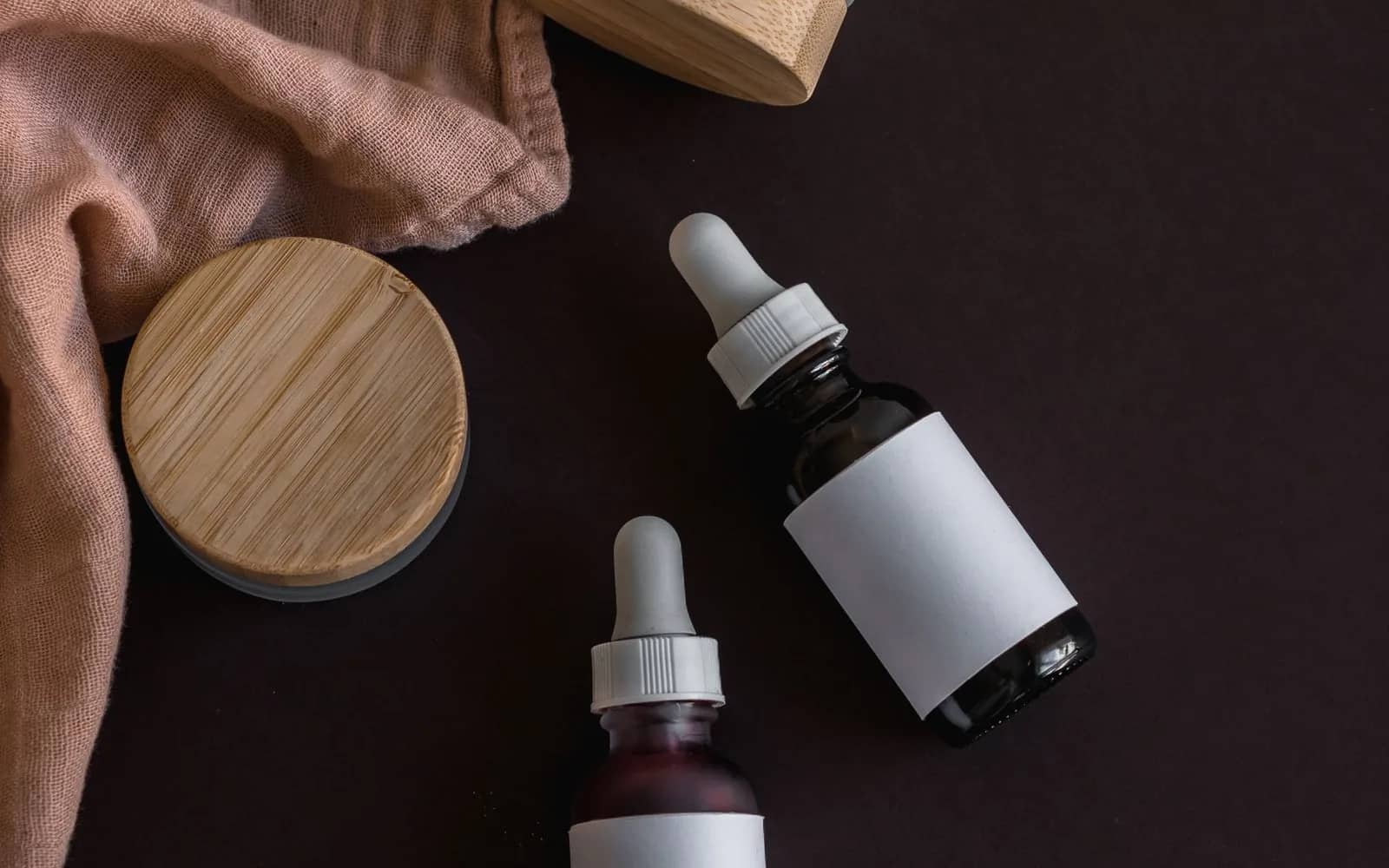 Serum bottles with wooden lids